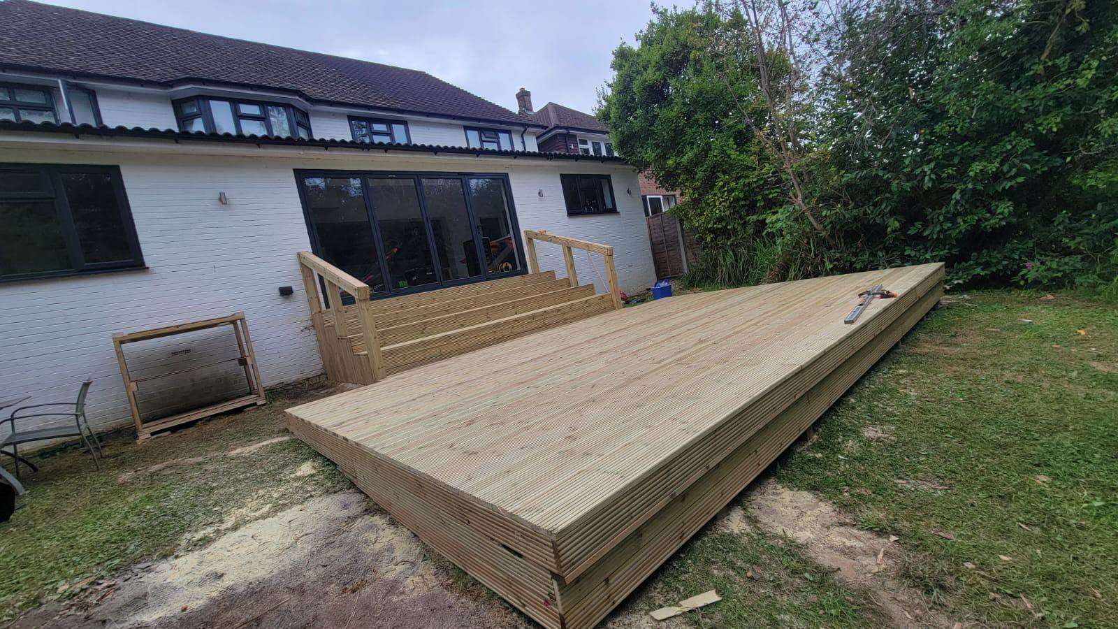 Finished timber garden decking built by CN Construction in Surrey