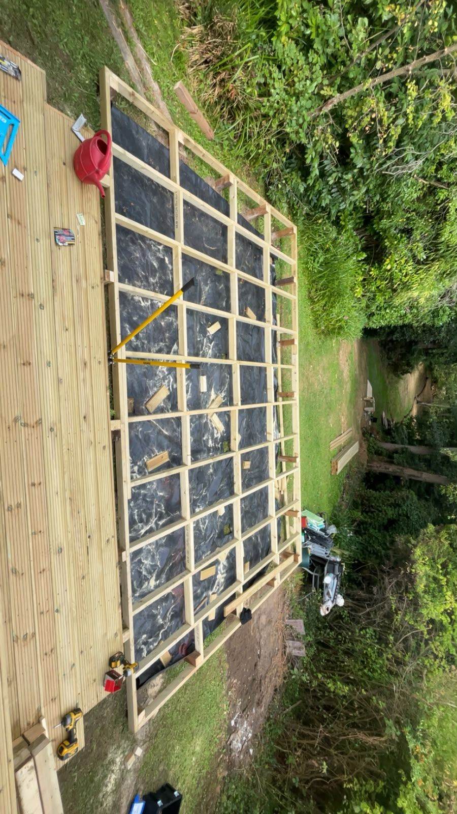 Close-up of structural timber joist grid during construction