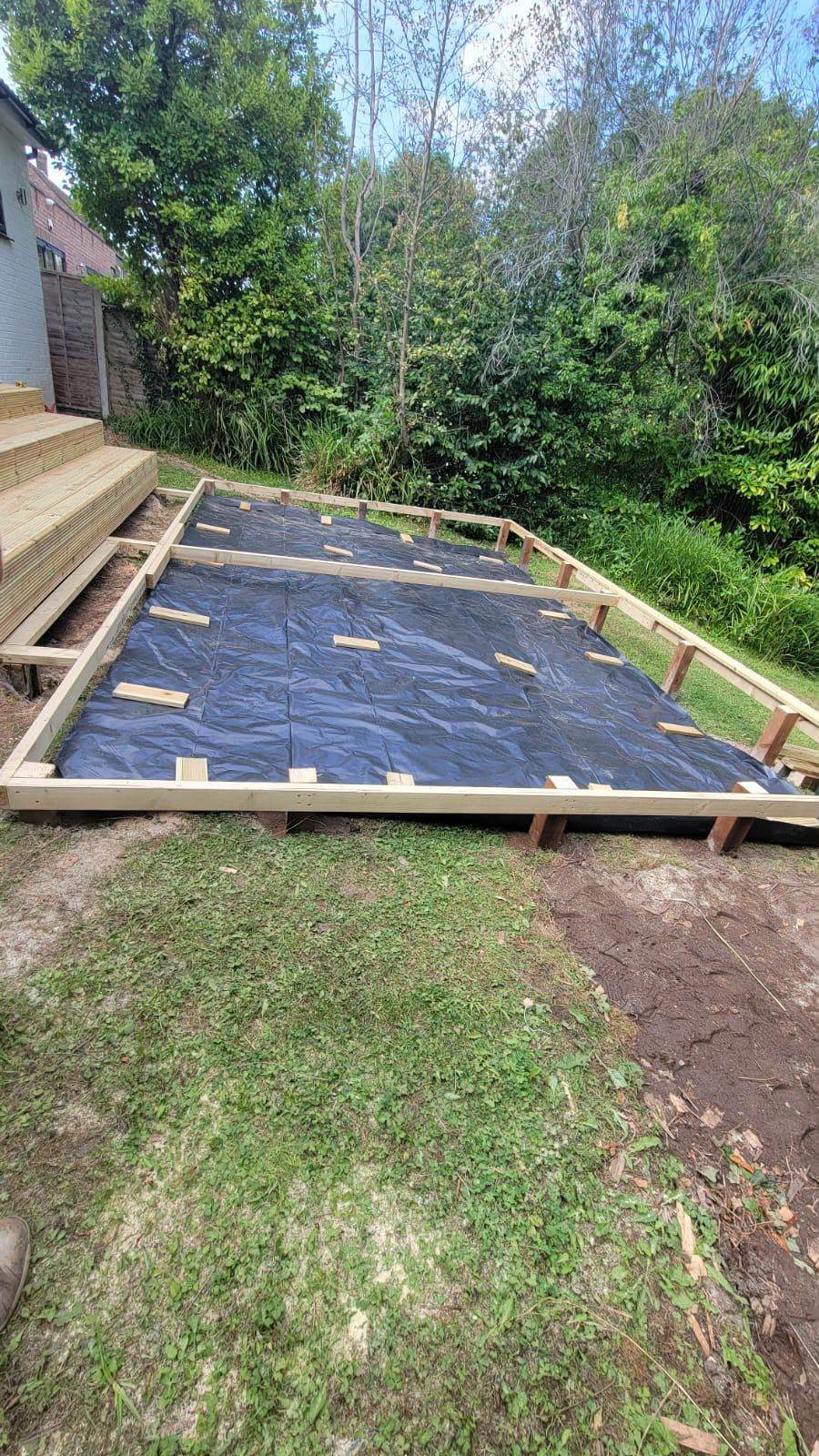 Sub-base membrane and timber sub-frame laid during groundworks