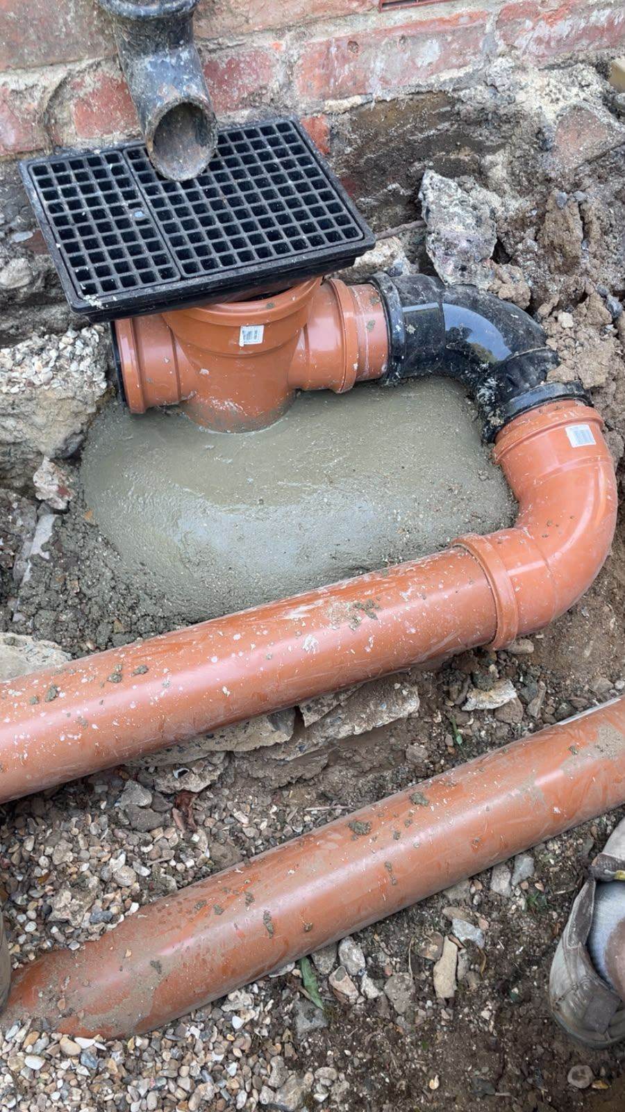 New drainage inspection chamber and pipework installed during groundworks